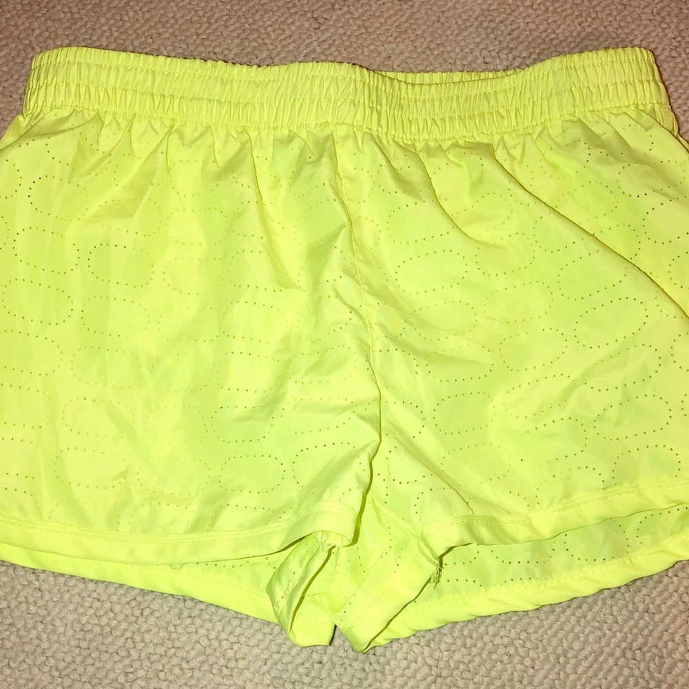 Neon yellow running shorts